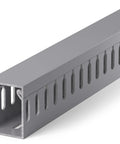 Grey PVC open slot raceway from Under Desk Cable Management Raceway Kit 6X 16.5 Inch Sections, 99 Inch Total Length, high capacity cable organizer.