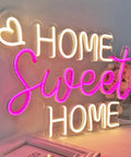 Home Sweet Home Neon Sign For Modern Home Decor Wall Art For Living Room Bedroom And Apartment To Elevate Your Cozy Vibe With Dimmer Switch And Included Power Adapter lit up on a table