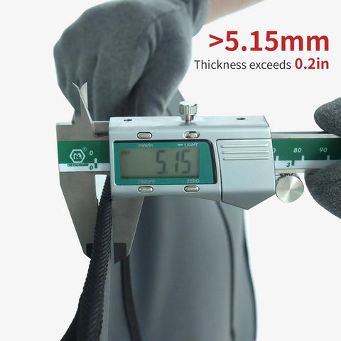 Caliper measuring thickness of waterproof leather back seat protector material, showing 5.15mm thickness, for anti-kick mat.