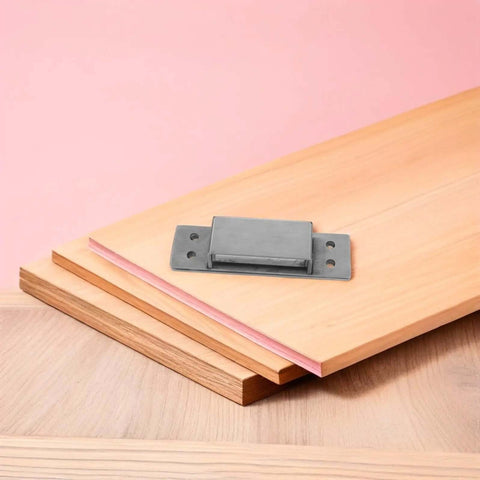 Concealed Adjustable 5 Inch Silver Door Hinge for wooden cabinets and secret bookcases displayed on wooden boards, pink background.