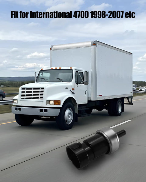 Vaticas air brake pressure switch, black plastic body with silver collar, shown beside a white International box truck.
