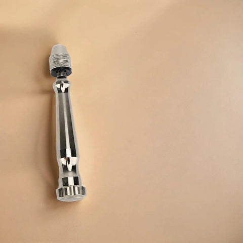 Pin Vise Hand Drill Kit With Aluminum Alloy Manual Small Drill displayed on a beige background