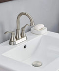2-Handle Brushed Nickel Bathroom Sink Faucet With 360 Degree Swivel High Arc Spout and 4 Inch Centerset installed on vanity