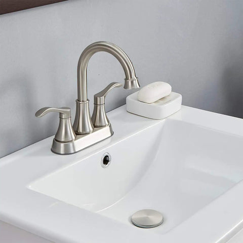 2-Handle Brushed Nickel Bathroom Sink Faucet With 360 Degree Swivel High Arc Spout and 4 Inch Centerset installed on vanity