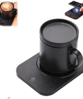 Solidly Built Wireless Charging Mug Warmer And Desk Phone Base With Auto Shut Off Keeps Your Morning Brew Piping Hot While You Charge On The Fly In Classic Black on a flat surface.