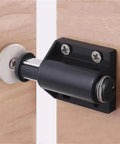Close-up of a magnetic latch from the 16 Pieces Magnetic Push To Open Cabinet Latches for Easy Breezy Wardrobe Doors Rebound Magnet Set