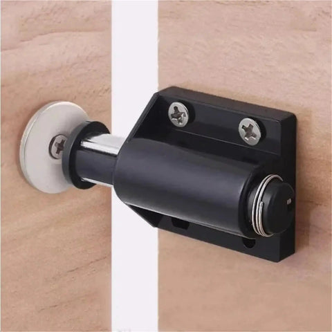 Close-up of a magnetic latch from the 16 Pieces Magnetic Push To Open Cabinet Latches for Easy Breezy Wardrobe Doors Rebound Magnet Set