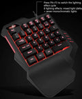 Compact 35 Key Mechanical Gaming Keyboard With Ergonomic Wrist Rest And Snappy One Handed Keypad delivering red RGB backlights.