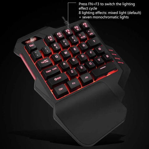 Compact 35 Key Mechanical Gaming Keyboard With Ergonomic Wrist Rest And Snappy One Handed Keypad delivering red RGB backlights.