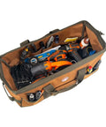 Top view of Longboy Tool Bag With 16 Pockets, Heavy Duty 24 By 10 By 10 Inch Black Work Organizer filled with assorted tools