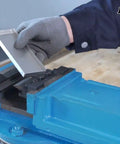Person using 5 Inch Vise Mount Brake Bender Attachment for Metalworking that bends up to 14 gauge mild steel and 2mm aluminum, 125mm capacity