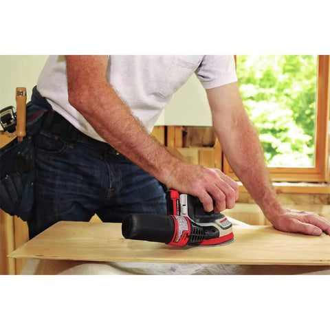 Person using 20V Max Cordless 5 Inch Random Orbital Sander Tool Only With Detachable Dust Bag Vacuum Port For One Quarter Inch Hose