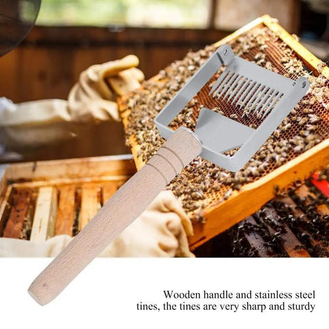 Sturdy Stainless Honeycomb Uncapper Fork With Wooden Handle For Beekeeping Pro Grade Heavy Duty Uncapping Tool in use on honeycomb.