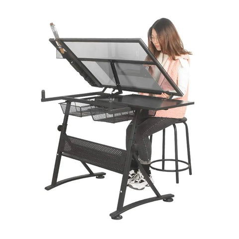 Premium Height Adjustable Tilting Drawing Desk With Tempered Glass Surface in use, featuring a woman seated with drafting tools.