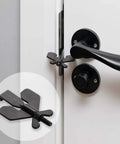 Travel Ready Lightweight Portable Door Lock For Travelers With A Patented Design installed on a door, showing close-up detail.