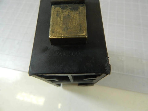 Close-up of Single unit Stop latch with proximity sensor CLAMP 310A for industrial gate safety interlock switch, metal component visible.