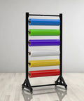 Heavy Duty Mobile Wire Coil Storage Organizer Rolling Cart With Thick Steel Frame holding colorful rolls of paper in craft room.