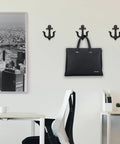 Nautical Sea Anchor Wall Hooks Set Of Four Cast Iron Vintage Coat Rack Heavy Duty Hangers For Bathroom Hallway Rustic Farmhouse Home Decor Built Different With Mounting Screws Black displaying a black bag.