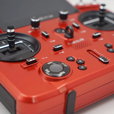 Close-up of Tandem X20R Dual Band Transmitter controls and dials for 2.4Ghz and 900Mhz RF Link, highlighting red casing.
