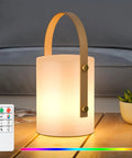 Cordless LED Lantern Table Lamp With Remote, IP44 Shower Safe and Waterproof, shown on patio table.
