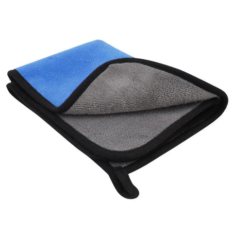 Folded blue and gray microfiber towel with black trim