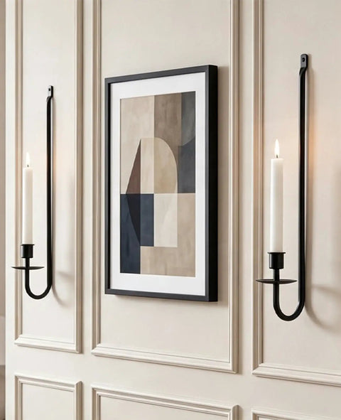 Built Tough Matte Black Farmhouse Wall Candle Sconce Holder Set of Two Heavy Duty Thick Iron Metal Wall Decor with Scratch Proof Finish for Warm Ambient Vibes, mounted beside wall art.