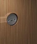 Hella Sturdy Solid Brass Smart Deadbolt With Slick Bluetooth Plus WiFi Enabled Keyless Entry Digital Door Lock In Lifetime Satin Nickel Finish installed on a wooden door.