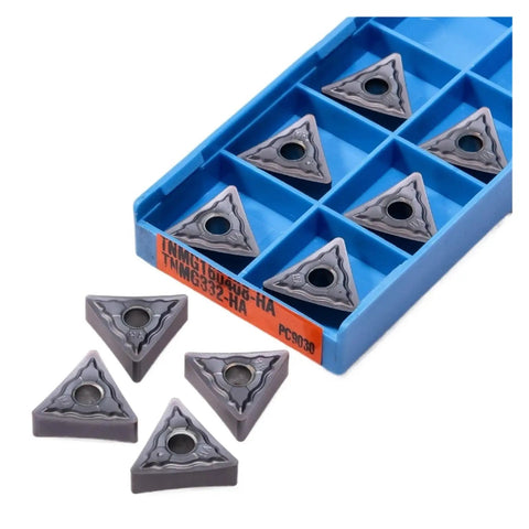Check Out These 10 Pc Indexable Carbide Lathe Tools With Tough TNMG160408 Inserts And A Super Sharp Edge That Rocks On Stainless Steel Plus Heavy Duty Hard Alloy Turning Blades For All Your Metal Fabrication Jobs. Display of TNMG160408 inserts in blue case.
