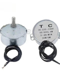 Heavy Duty AC 220V Synchronous Motor Running Like A Smooth Operator At 5 To 6 RPM With Serious 4 kgf Cm Torque For Microwave Trays And Reliable Fan Builds, showing metal casing and wire connections.
