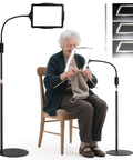 Elderly woman knitting under Big Floor Magnifying Glass With Light And Stand 48 LED Lighted Adjustable Height Floor Magnifier Lamp