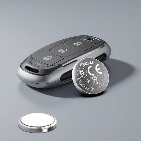 Top Shelf CR2032 Lithium 3V Coin Cell Batteries 20 Pack next to a modern car key fob on a gray background.