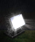 Magnetic 15W LED Work Light With 180 Degree Rotation Waterproof Spotlight shining brightly in rain