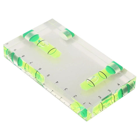 Transparent Bubble Level showing dual vials and built-in ruler, size 95 x 51 x 13 mm, lightweight for accurate leveling.