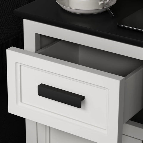 Top Shelf 10 Pack Of Matte Black Finger Edge Pulls With Five Inch Center Spacing And Smooth Rounded Corners Perfect For Kitchen Cabinets And Dresser Drawers That Is A Total Game Changer For Your Home Makeover, shown on white drawer.