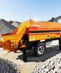 Compact Mini Concrete Mixer And Pump Combo Real Deal Job Site Grinder with orange body, used for mixing cement at construction sites.