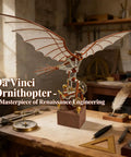 Da Vinci Flapping Wing DIY Model Kit 3D Metal Wind Up Ornithopter in workshop setting, showcasing detailed Renaissance design