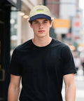 Man wearing lightweight trucker cap for men and boys breathable baseball hat with soft comfortable fit for running hiking