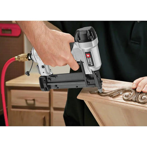 Dead Simple Six Gallon Pancake Air Compressor Bundled With Three Pro Nail Guns Including Finish Nailer Brad Nailer And Pin Nailer Plus Rugged Hose For Any Weekend Warrior Project, using a finish nailer on wood.