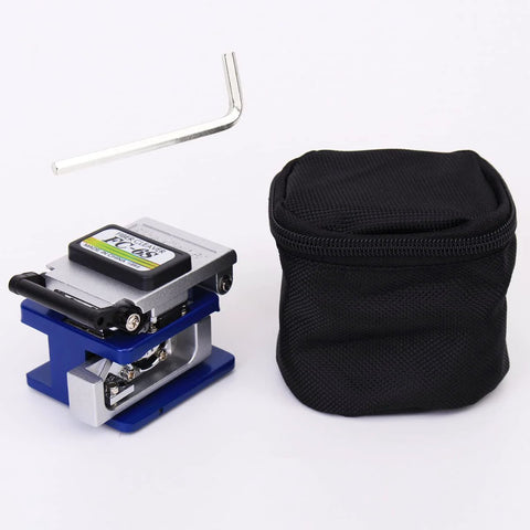 Front view of fiber optic termination tool with FC-6S cleaver on a blue base beside a black zippered carrying case