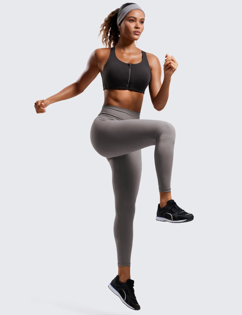 Woman wearing Zip Front High Impact Sports Bra With Molded Cups, Wireless Convertible Straps, Medium To High Support, Size 36C