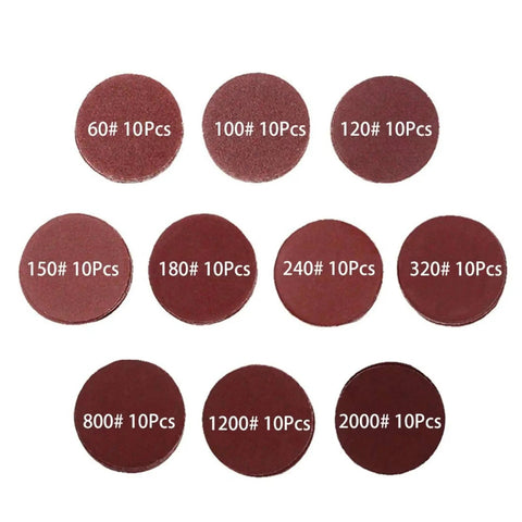 Top Notch 2 Inch Red Sanding Discs Pad Kit With Up To 102 Pieces Offering Smooth Wood And Metal Finishing For Drilling Grinding And Polishing Tasks Across Multiple Grit Levels From 60 To 2000 For Serious DIYers, showing various grit sandpaper discs.