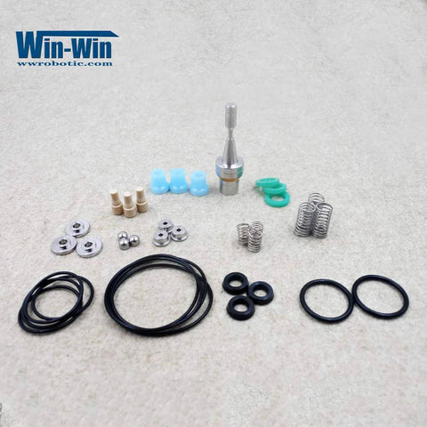 Front view of 2Pcs waterjet inlet poppet spare parts kit with springs, seals, O-rings, and nozzles.