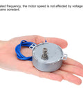 Hand holding Go-To Small Synchronous Motor 100-127V AC 30-36 RPM Gear Motor 4W with CW CCW shaft rotation and wires