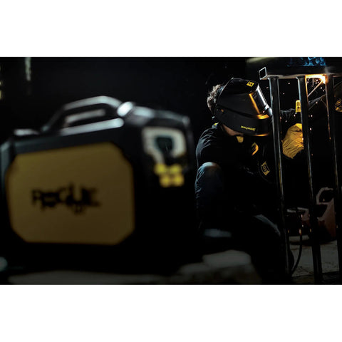 Person welding with Savage A40 Black Auto Darkening Welding Helmet Pro Grade With External Shade Adjustment From DIN 9 To DIN 13 Four Arc Sensors True Color Viewing Lens And Internal Delay And Sensitivity Controls