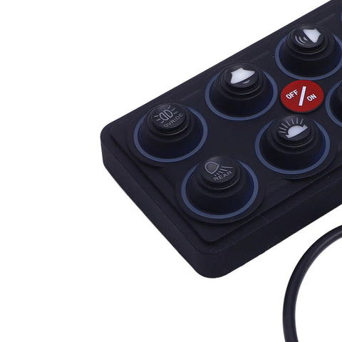 Close-up of 8 Gang LED Switch Panel With Auto Dimmable Touch Control For Car Boat SUV, rugged design, showing six buttons.