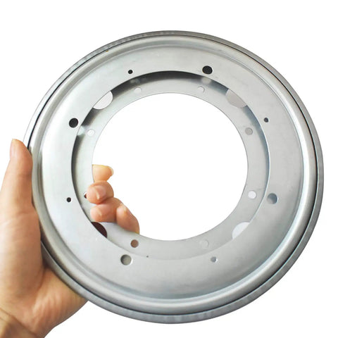 Built Tough Nine Inch Lazy Susan Hardware Kit With Square Rotating Bearing Plate held in hand showing metal design for cabinetry.
