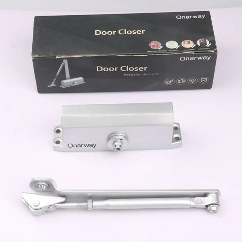 Silent Glide Hydraulic Door Closer Delivers Featherlight Soft Close Every Time with silver metal body and included mounting arm.