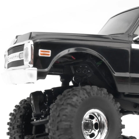 Aluminum Dual Hole 4mm Suspension Lift Shock Mounts For Axial 1 To 30 SCX30 K10 Bronco JLU visible under black truck body