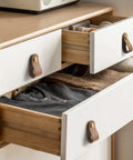 Two open drawers with brown leather drawer pulls 6 pack for kitchen cabinets and drawers, textured leather handles with grain finish.