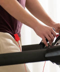 Treadmill Safety Key With Magnet Lock Replacement Kit for running machines clipped to pants, showing emergency stop accessory in red.